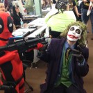 Kid Deadpool holds up the Joker at The Great Allentown Comic Con