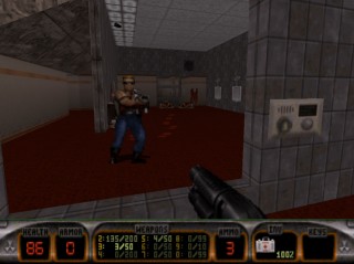 Duke Nukem checks himself out in mirror after killing some aliens - Duke Nukem 3D