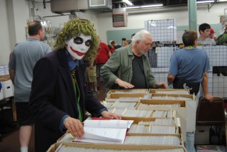 The Joker going through some short boxes at The Great Allentown Comic Con