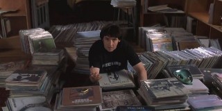  Rob Gordon with his huge collection of vinyl in High Fidelity